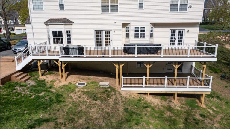 Elevated composite deck with white rail — Fredericksburg Deck Builders