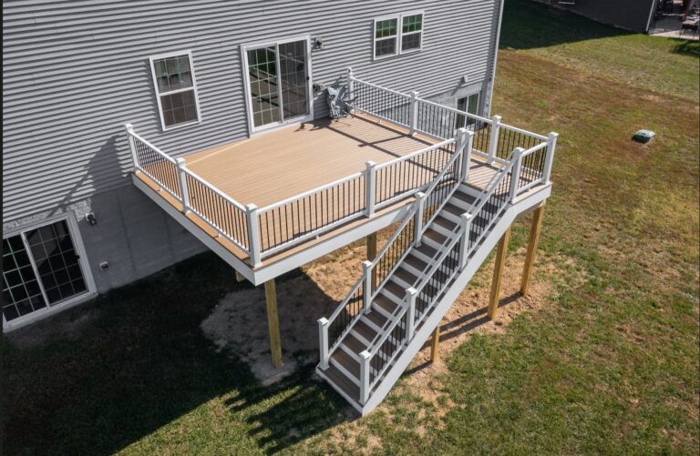 Composite deck with stairs to grade — Fredericksburg Deck Builders