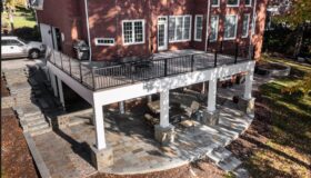 Elevated deck with stone patio below — Fredericksburg Deck Builders