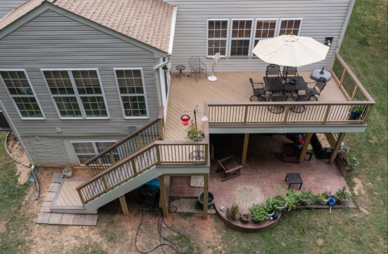 Wood deck with stairs and paver patio below — Fredericksburg Deck Builders