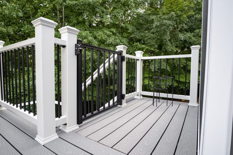 White rail posts with black balusters and a matching gate — deck railing by Fredericksburg Deck Builders, Fredericksburg VA