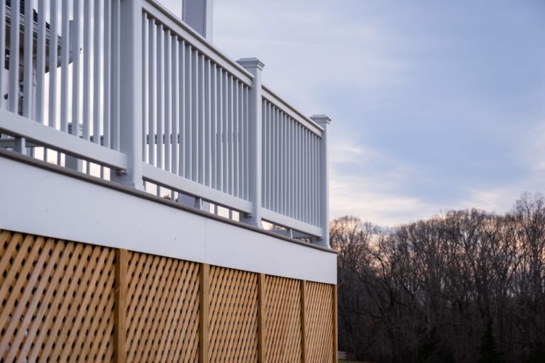 White railing over lattice skirting — deck railing by Fredericksburg Deck Builders, Fredericksburg VA
