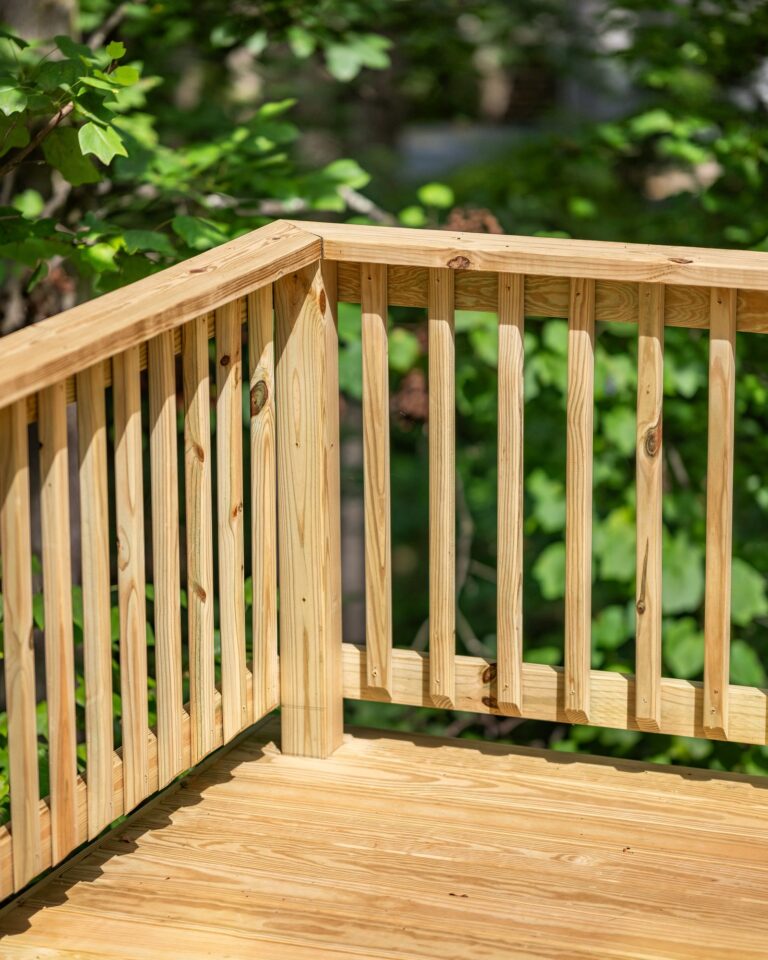 Wood deck railing corner — deck railing by Fredericksburg Deck Builders, Fredericksburg VA